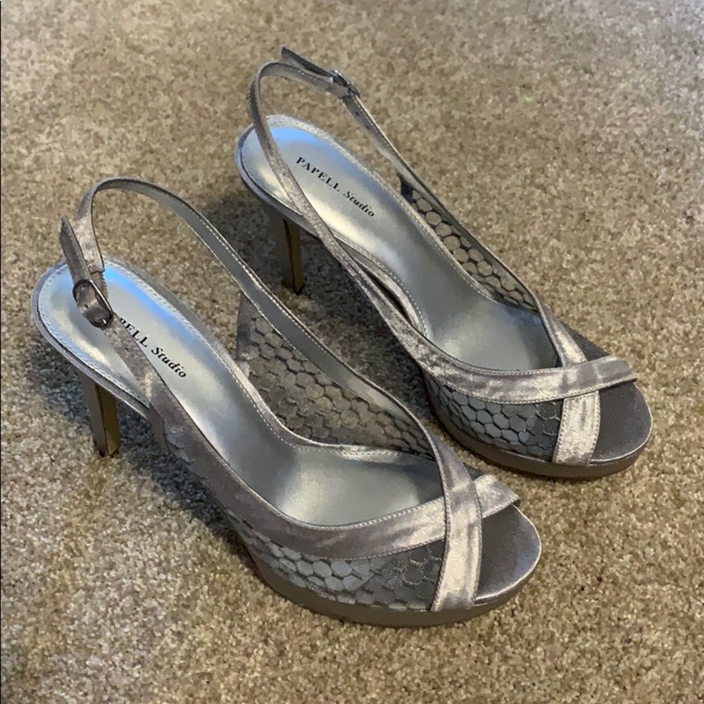 New! Silver/gray heels. Never worn. 3 in. heels.